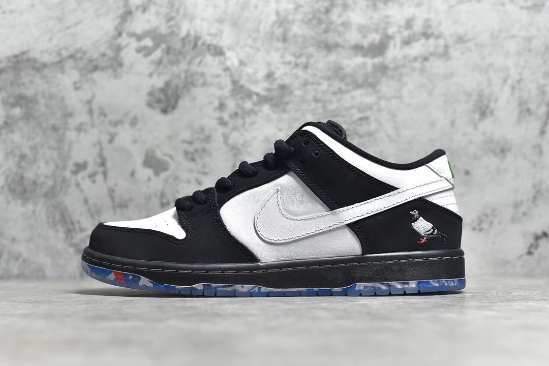outside view of Panda Pigeon SB Dunk showing color contrast