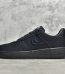 outside view of black Stussy Air Force 1 low reps
