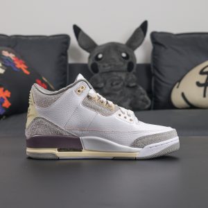 Side view of A Ma Maniere Jordan 3 reps in grey suede and aged midsole