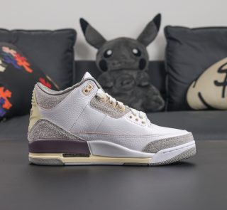 Side view of A Ma Maniere Jordan 3 reps in grey suede and aged midsole