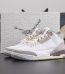 A Ma Maniere Jordan 3 reps with one shoe placed in front of shoebox