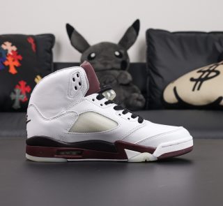 Inner side of A Ma Maniere Jordan 5 Burgundy Crush reps with mesh panels