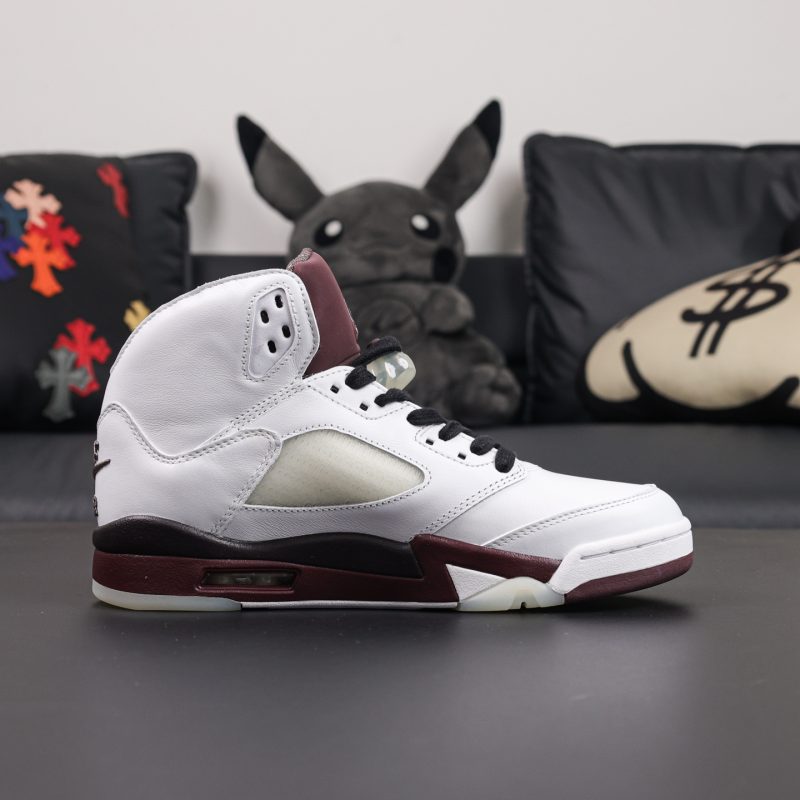 Inner side of A Ma Maniere Jordan 5 Burgundy Crush reps with mesh panels