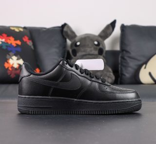 Inside view of Air Force 1 Black Reps showing smooth black leather panels