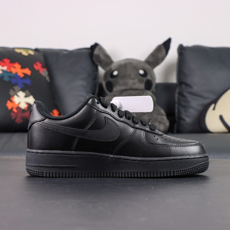 Inside view of Air Force 1 Black Reps showing smooth black leather panels
