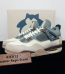 Air Jordan 4 Snorlax Reps with box displayed on table