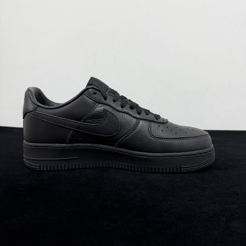 Inside view of CPFM Air Force 1 Black Reps with layered lettering detail