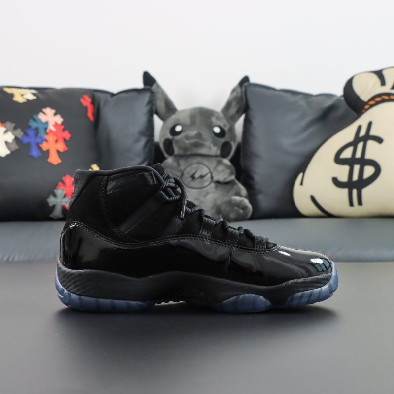 Side view of Jordan 11 Cap and Gown reps with suede and patent mix