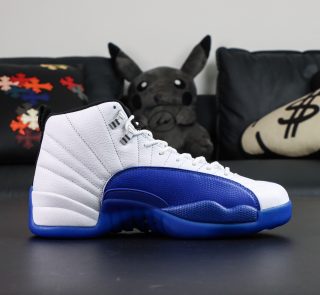 Inner side of Jordan 12 Blueberry reps showing tumbled leather and stitched trim