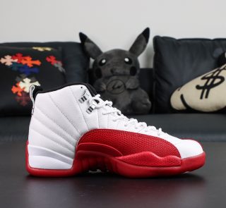 Inner side of Jordan 12 Cherry reps showing contrast between red and white panels