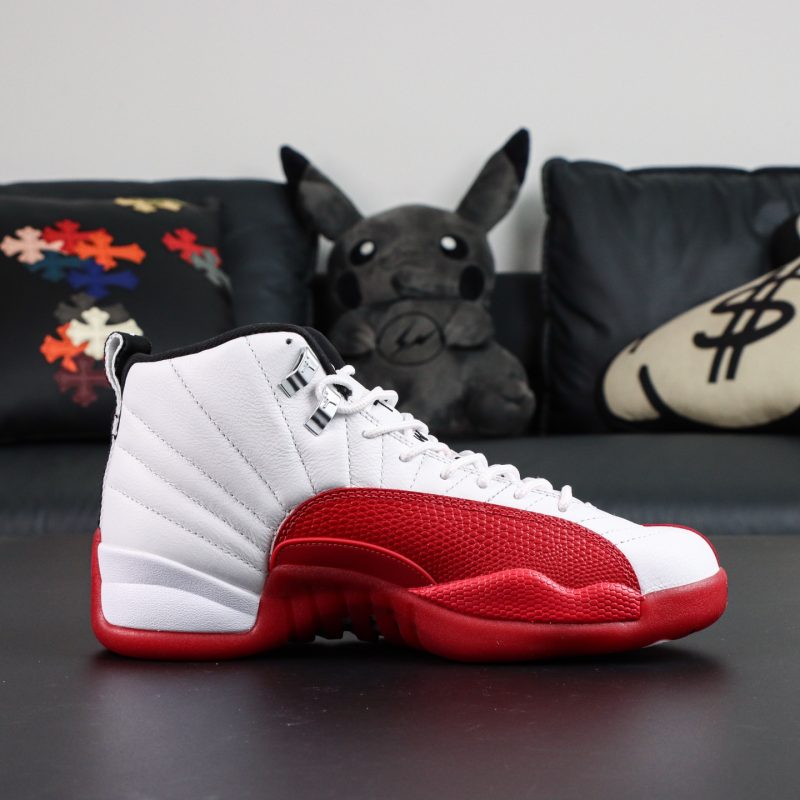 Inner side of Jordan 12 Cherry reps showing contrast between red and white panels
