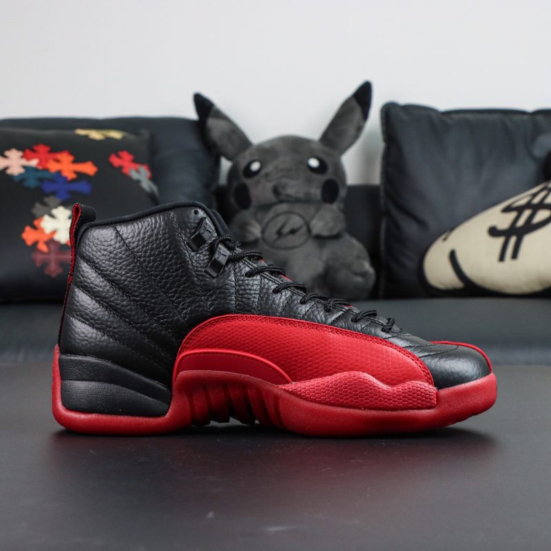 Inner view of Jordan 12 Flu Game 2025 reps with Varsity Red overlay