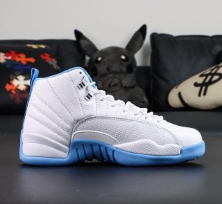 Inside angle of Jordan 12 Melo reps showing stitched overlays and blue lining