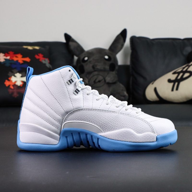 Inside angle of Jordan 12 Melo reps showing stitched overlays and blue lining