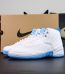 Jordan 12 Melo 2025 reps with white leather and University Blue details beside box