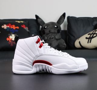 Inside view of Jordan 12 Twist reps showing stitched midsole and panel texture