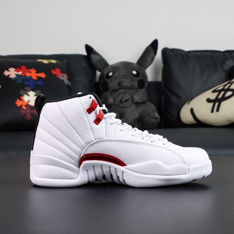 Inside view of Jordan 12 Twist reps showing stitched midsole and panel texture
