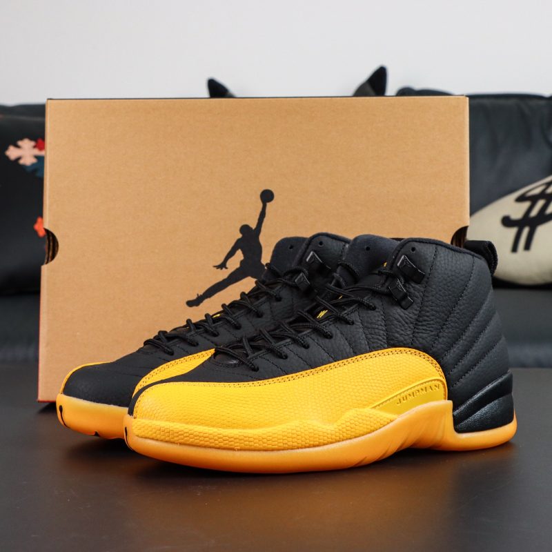 Jordan 12 University Gold reps with retail-style box, black upper and gold mudguard