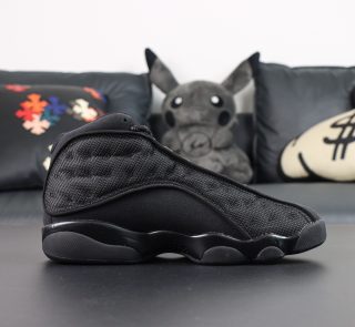 Inside view of Jordan 13 Black Cat Reps with reflective mesh