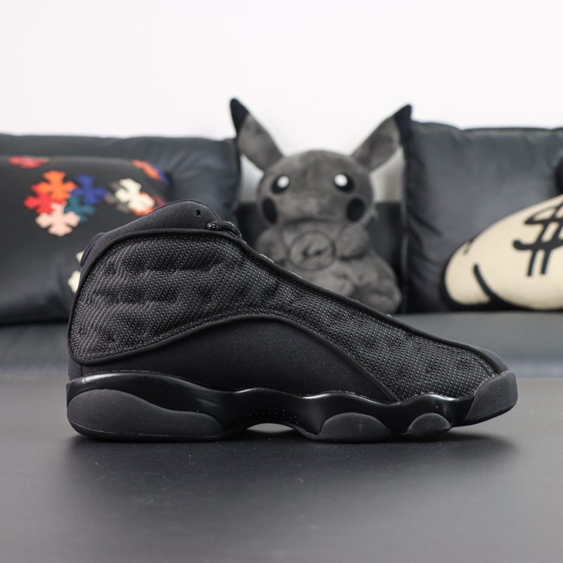 Inside view of Jordan 13 Black Cat Reps with reflective mesh