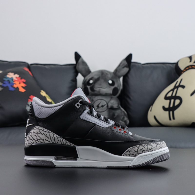 Side view of Jordan 3 Black Cement 2024 reps with grey elephant print