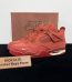 Jordan 4 Brick By Brick Reps with box displayed on table