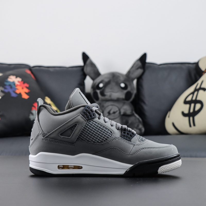 Side view of Jordan 4 Cool Grey replica sneaker with suede grey upper