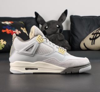 Inner side of Jordan 4 Craft Photon Dust reps with mesh and suede construction