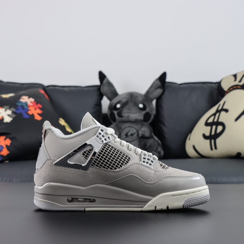 Side view of Jordan 4 Frozen Moments replica sneaker with chrome wings