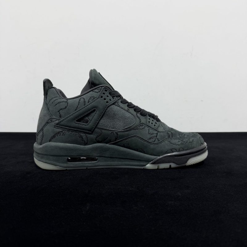 Inside view of Jordan 4 KAWS Black Reps with embossed hand graphics
