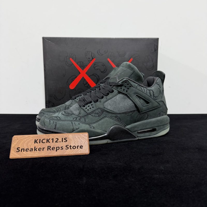 Jordan 4 KAWS Black Reps with box displayed on table