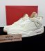 Jordan 4 Levi’s White Reps with box displayed on table