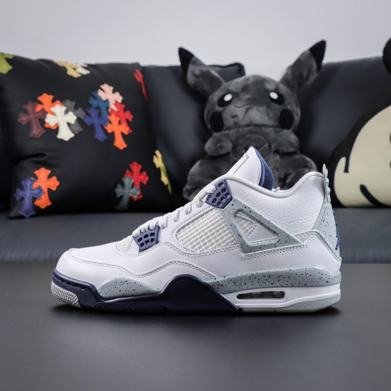 Side view of Jordan 4 Midnight Navy reps featuring white leather and navy netting