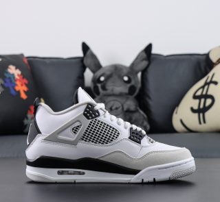 Side view of Jordan 4 Military Black reps showing black eyelets and grey mudguard