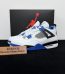 Jordan 4 Motorsport Reps with box displayed on table