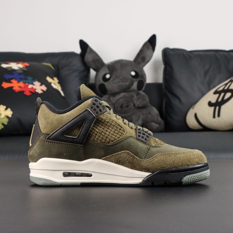 Inner side of Jordan 4 Olive reps with suede and mesh panels