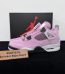 Jordan 4 Orchid Reps with box displayed on table