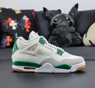 Side view of Jordan 4 Pine Green replica sneaker with white leather and green details