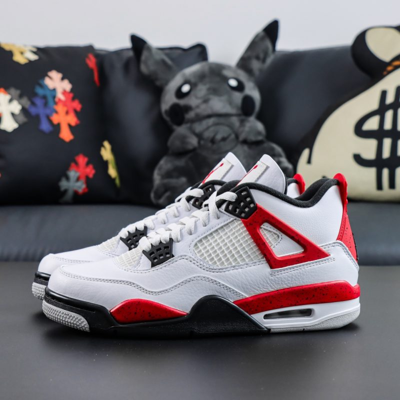 Side profile of both Jordan 4 Red Cement reps sneakers