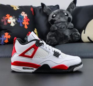 Side view of Jordan 4 Red Cement replica sneaker with white leather upper