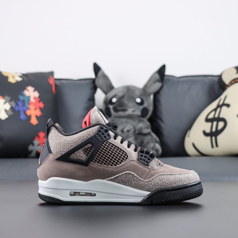 Side view of Jordan 4 Taupe Haze reps showing taupe suede and black netting