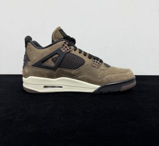 Medial side view of Jordan 4 Travis Scott Mocha Reps with mesh panels