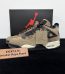 Jordan 4 Travis Scott Mocha Reps with box displayed on table
