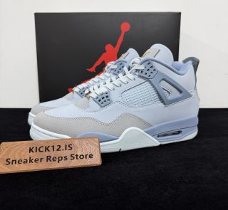 Jordan 4 UNC PE Reps with box displayed on table
