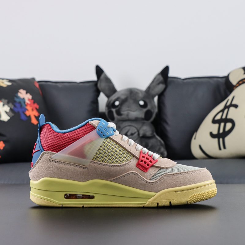 Side view of Jordan 4 Union Guava Ice reps showing mesh netting and UN/LA tag
