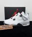 Jordan 4 White Cement 2016 Reps with box displayed on table