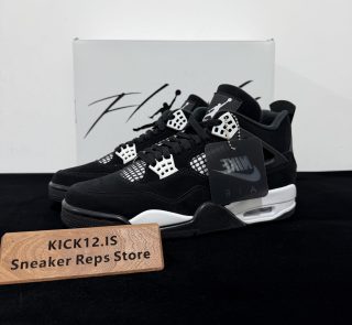 Jordan 4 White Thunder Reps with box displayed on table