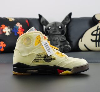Inside view of Jordan 5 Off White Sail reps with aged cutout design