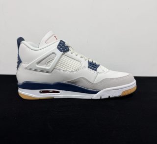 Medial side view of Nike SB Jordan 4 Navy Reps