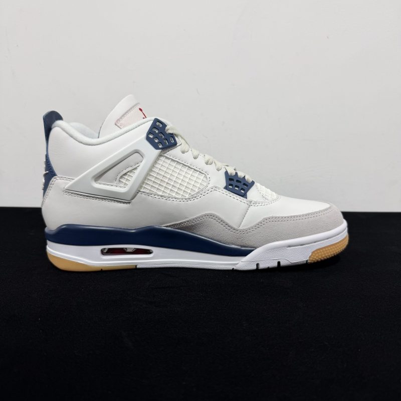 Medial side view of Nike SB Jordan 4 Navy Reps